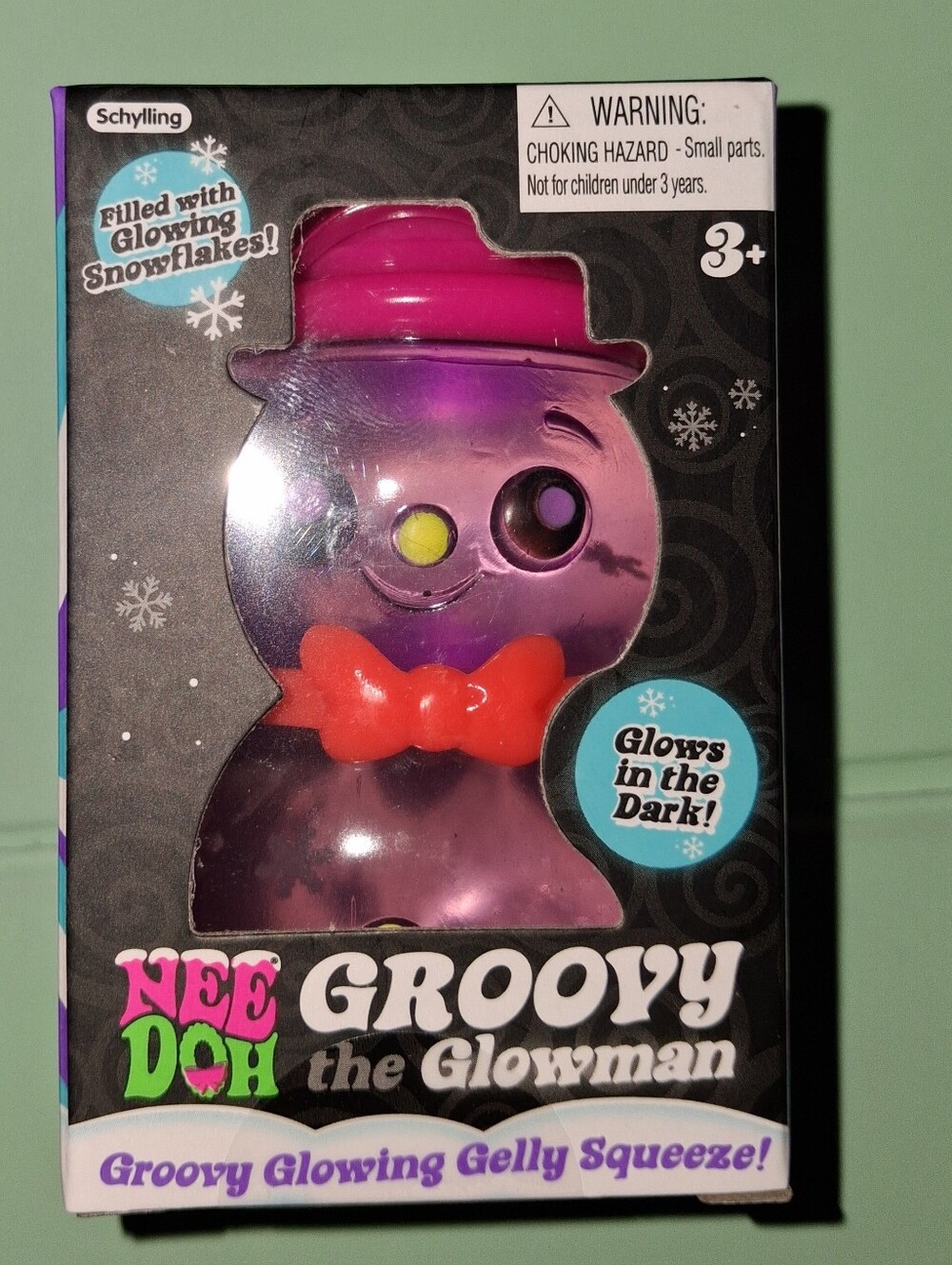NeeDoh Groovy the Glowman Glowing Purple & Pink Squeeze Toy